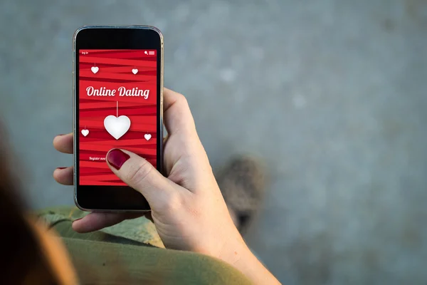 Woman walking with smartphone online dating app — Stock fotografie