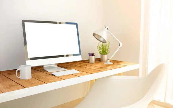 Espacio de trabajo con ordenador de pantalla en blanco — Foto de Stock