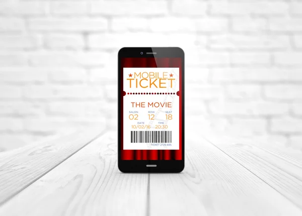 Smart phone cinema e-tickets over wooden table — Zdjęcie stockowe