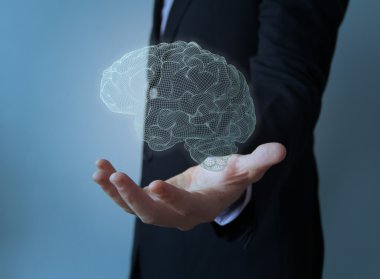 beyin üzerinde el ile iş adamı