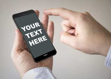  touchscreen smartphone with your text here on the screen