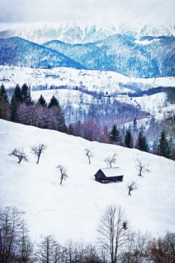 Wooden barn in the mountains clipart