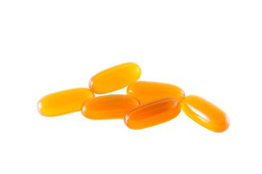 Yalıtılmış zemin üzerine sarı ilaç kapsül
