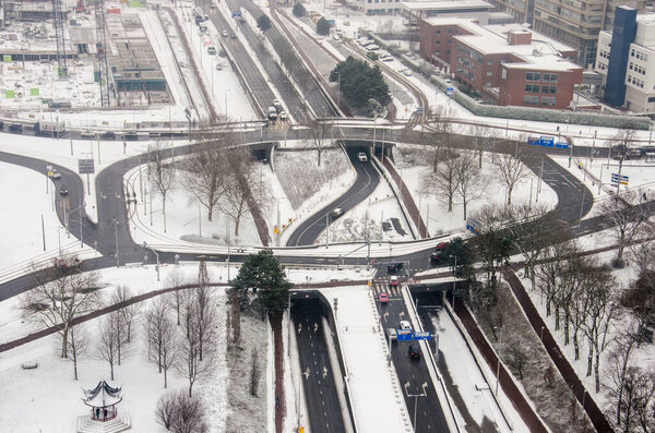 Rotterdam, The Netherlands, January 22, 2019: aerial view of Drooglever Fortuynplein traffic junction after recent snowfall