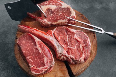 Fresh raw Prime Black Angus beef steaks. Variety of raw beef meat steaks for grilling. clipart