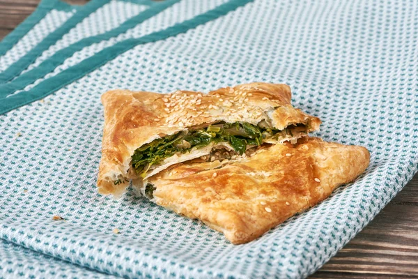 Pie with caraway on napkin — Stock Photo, Image