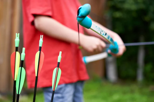 Little archer with bow and arrows — Stock Photo, Image