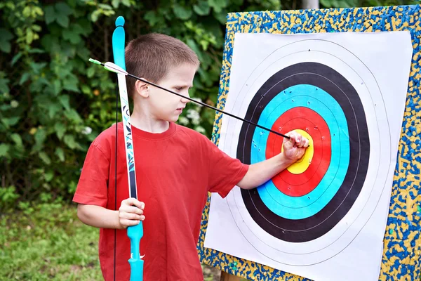 Little archer with bow and arrow — Stock Photo, Image