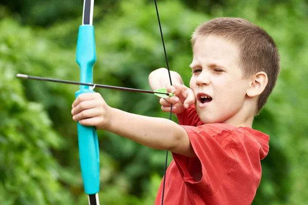 Little boy archer with bow and arrow — Stock Photo, Image