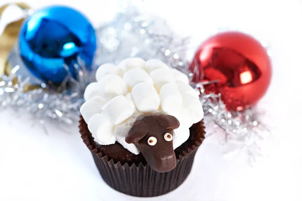 Cupcake and Christmas balls with marshmallow — Stock Photo, Image