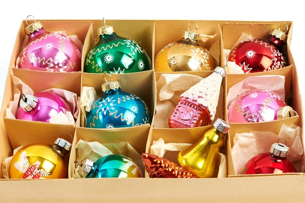 Christmas balls in a carboard box — Stock Photo, Image