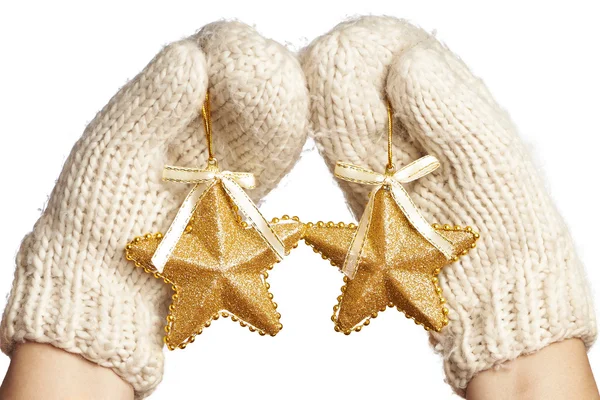 Female hands in mittens with Christmas stars — Stock Photo, Image