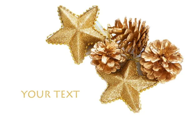 Gold plated pine cones and stars macro isolated — Stock Photo, Image
