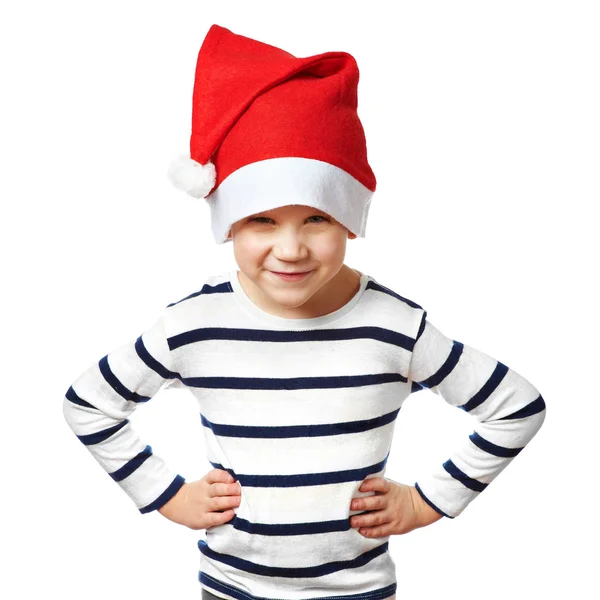 Kleine jongen in rode kerstmuts is grappig en boos geïsoleerd — Stockfoto