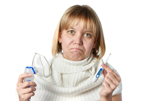 Sick woman holding digital thermometer and inhaler isolated — Stock Photo, Image