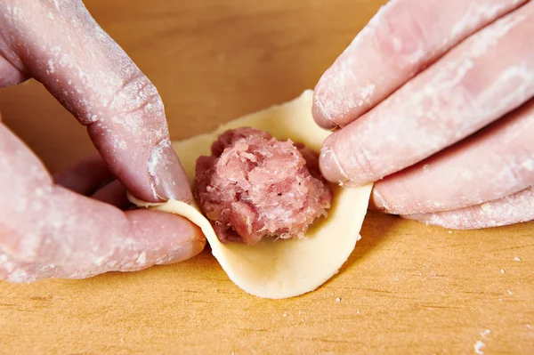 Sculpting of meat dumplings — Stock Photo, Image