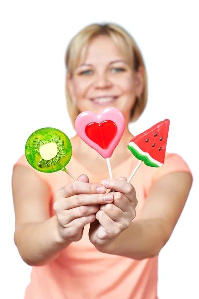 Glückliches Mädchen mit Lutscher-Herz, Wassermelone und Kiwi-Frucht — Stockfoto