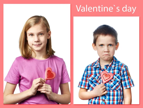 Beautyful girl and boy with lollipop hearts — Stock Photo, Image
