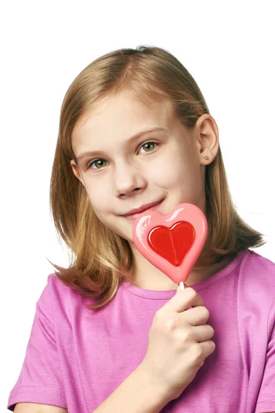Beautiful girl with lollipop hearts — Stock Photo, Image