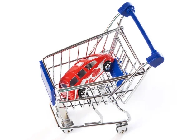 Carrinho de compras com carro — Fotografia de Stock