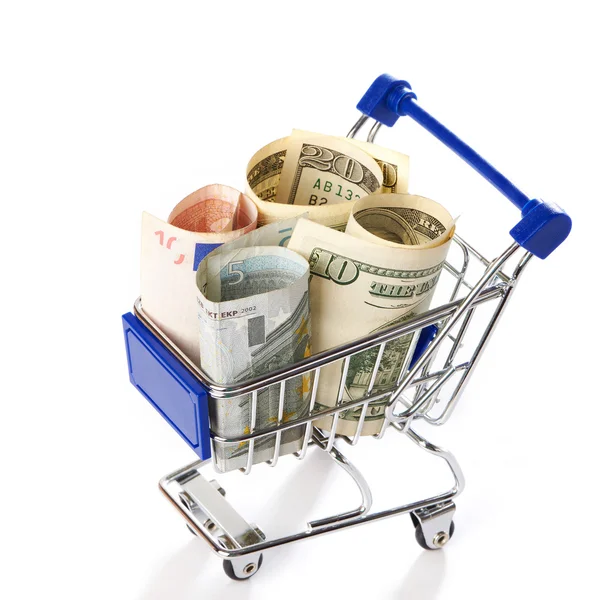 Shopping trolley with money isolated — Stock Photo, Image