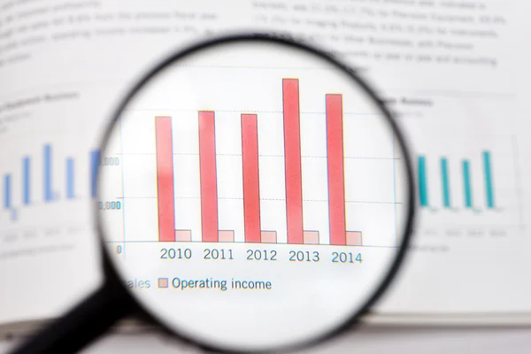 Magnifying glass and statistic — Stock Photo, Image