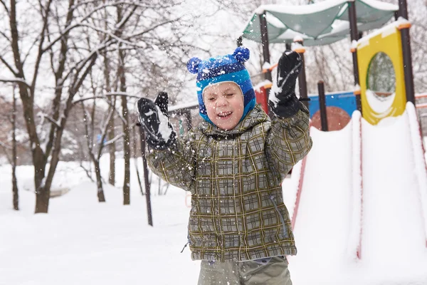 Little boy on winter playground — Stock Photo, Image