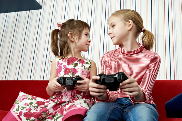 Girls playing on games console — Stock Photo, Image