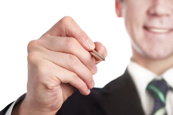 Businessman writes a pen — Stock Photo, Image