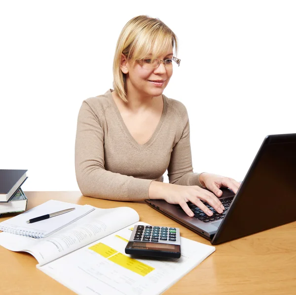 Woman working with laptop computer in office — Stock Photo, Image