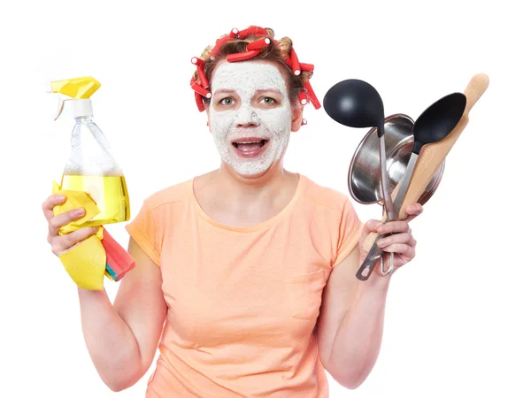 Housewife with rag, roller-pin and pan Stock Picture