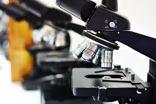 Lenses of different multiplicity of microscope — Stock Photo, Image