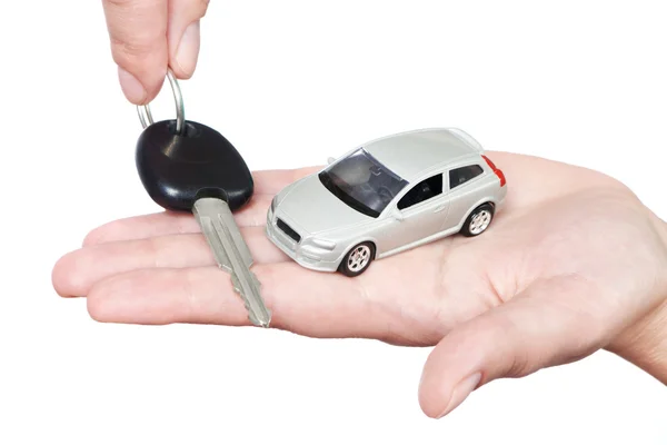 Mão com chaves e carro — Fotografia de Stock