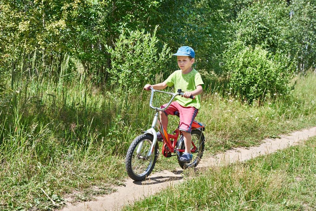 little boy on bike