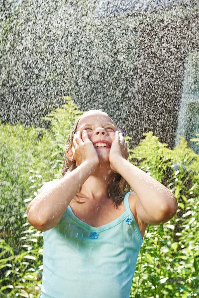 Happy girl under rain — Stock Photo, Image