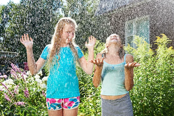 Two happy girl under rain — Stock Photo, Image