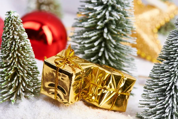 Gifts in gold packaging — Stock Photo, Image