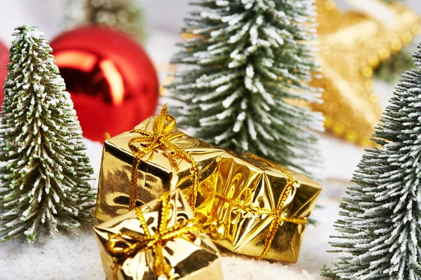 Gifts in gold packaging — Stock Photo, Image