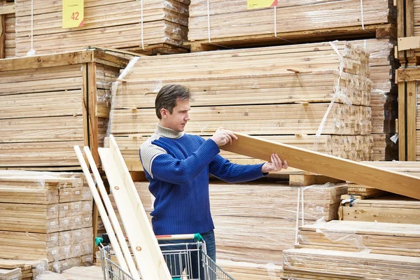 Man shopping for timber in shop