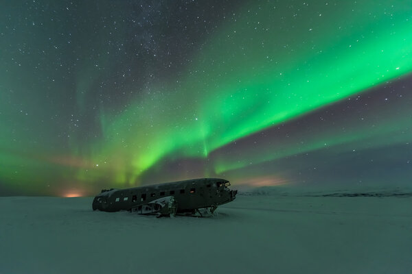 northern lights over plane wreck