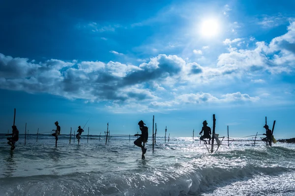 Traditional fishermen on sticks — Stock Photo, Image