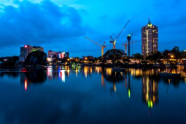 Colombo skyline at night clipart