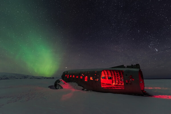 northern lights over plane wreck