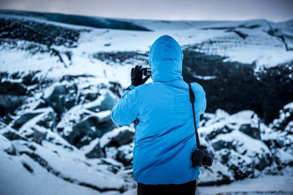 Tourist at glacier cave — Stock Photo, Image