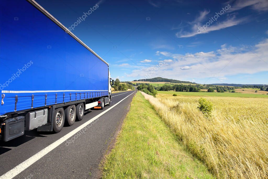 Truck transport on the road and cargo