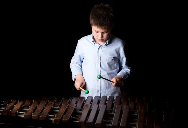 Boy playing on xylophone — Stock Photo, Image