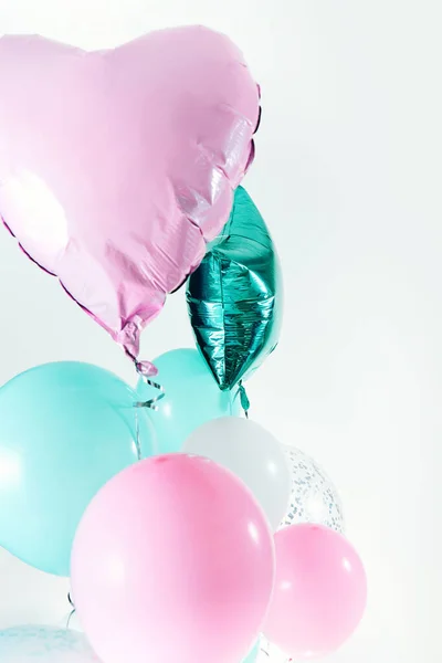 空气气球 空气气球 一套柔和的粉红碧绿的心 星形的箔气球 度假背景 情人节派对装饰 金属气球生日 免版税图库图片