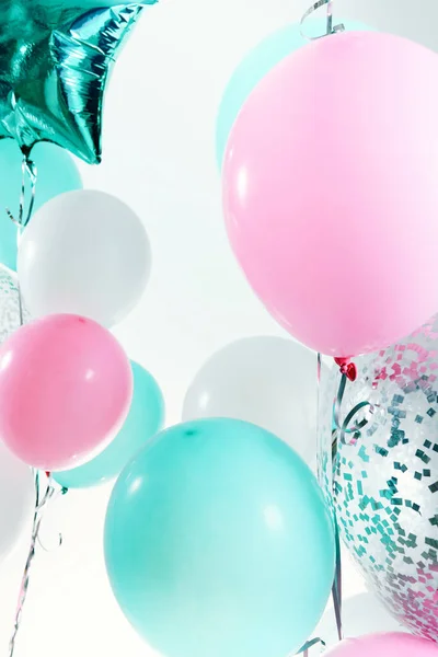 空气气球 空气气球 一套柔和的粉红碧绿的心 星形的箔气球 度假背景 情人节派对装饰 金属气球生日 图库图片
