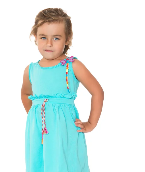 Meisje in turquoise jurk — Stockfoto
