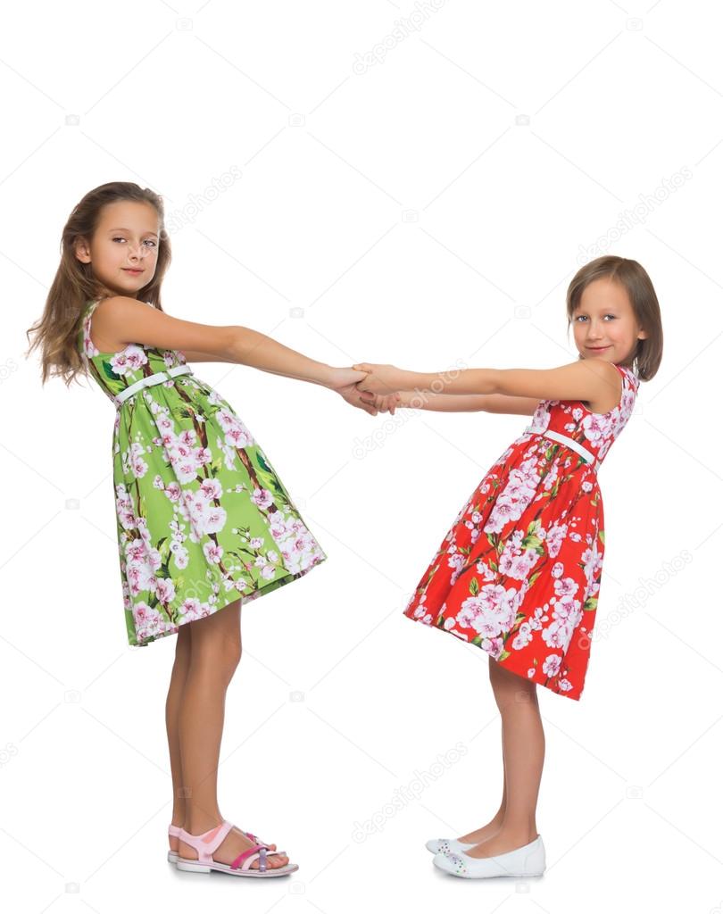 Girls holding hands